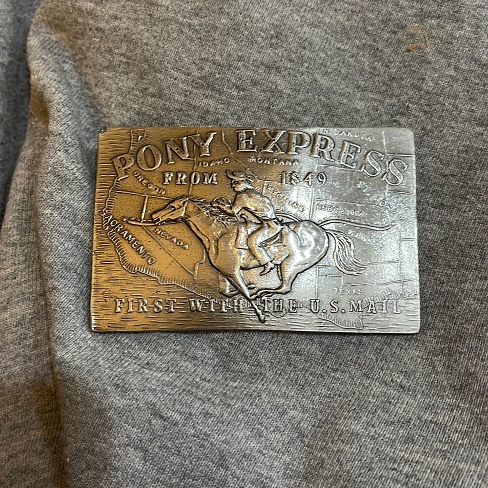 Lewis buckles Pony Express